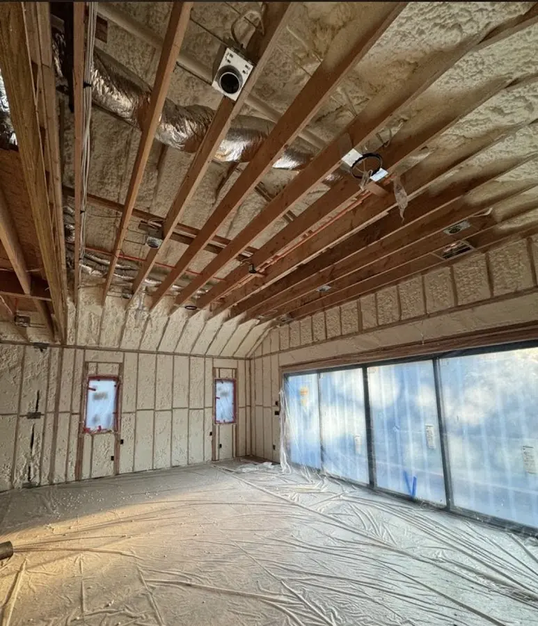 Interior walls and ceiling insulated with spray foam during new construction in Miami